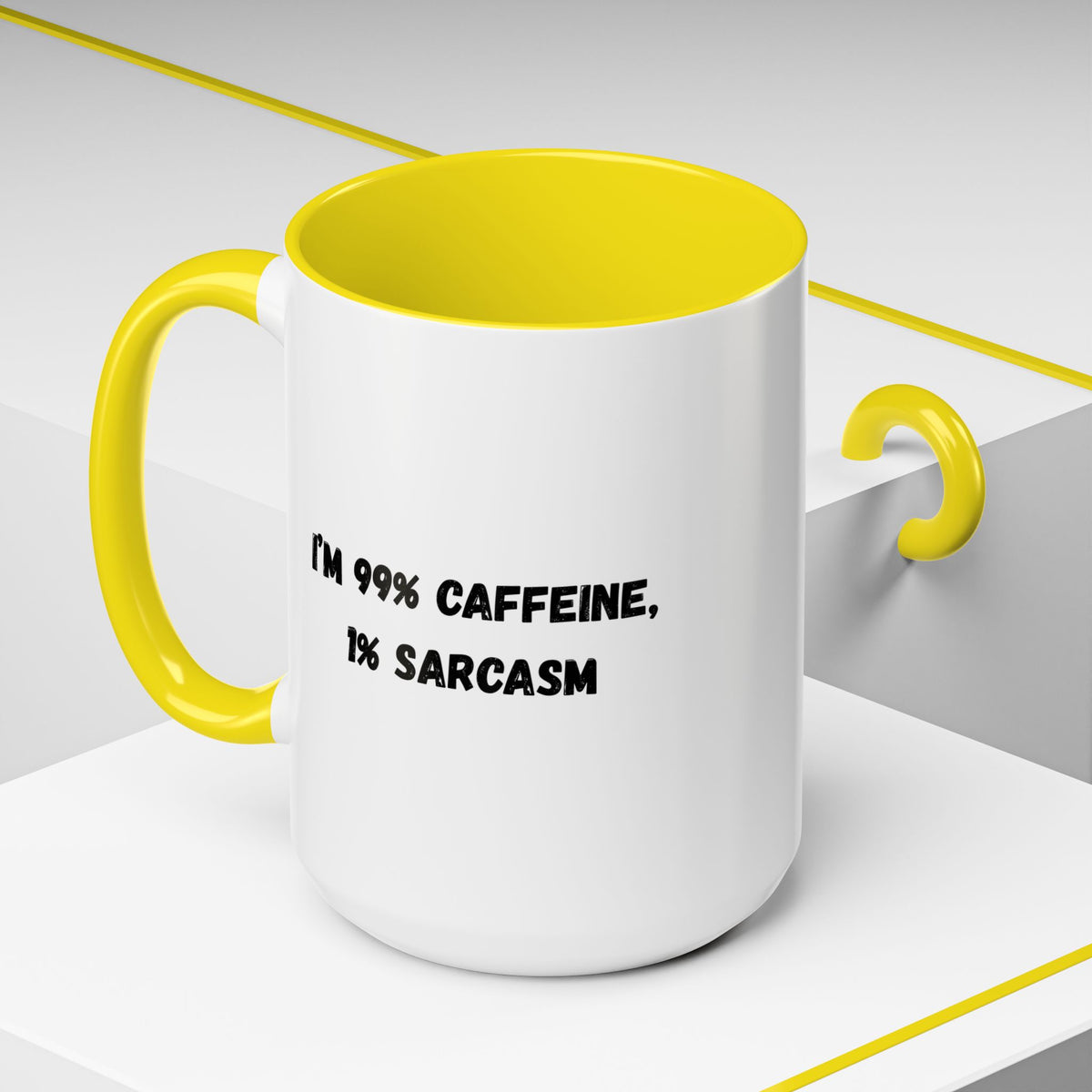 Ceramic coffee mug with "I'm 99% Caffeine, 1% Sarcasm" print, featuring a white background and colorful lettering.