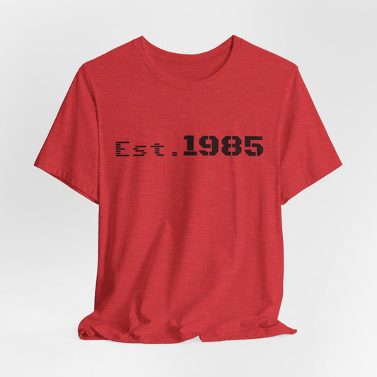 Printify vintage Est. 1985 graphic T-shirt featuring a stylish design on a comfortable cotton T-shirt.