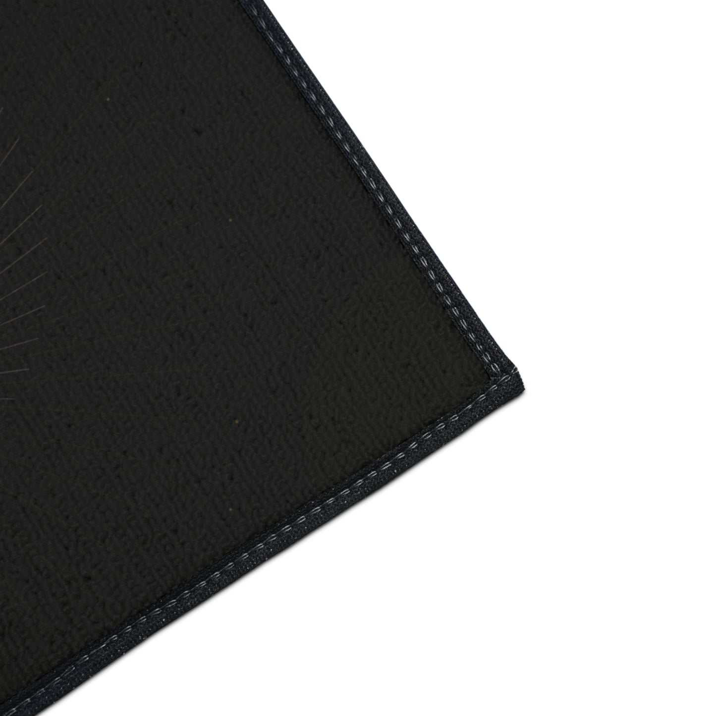Black Radiant Star Burst Floor Mat by Printify, entrance rug with starburst pattern, ideal for home or office entryways.