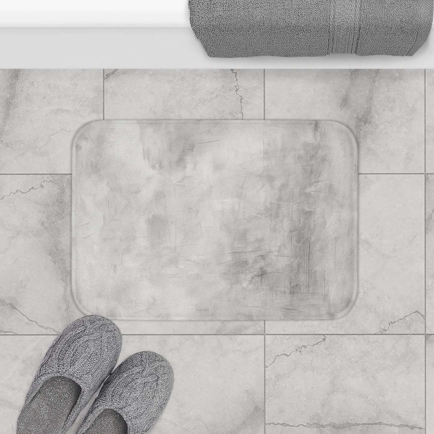 Grey modern minimalist bath rug by Printify, soft textured rug suitable for bathroom decor and housewarming gifts.