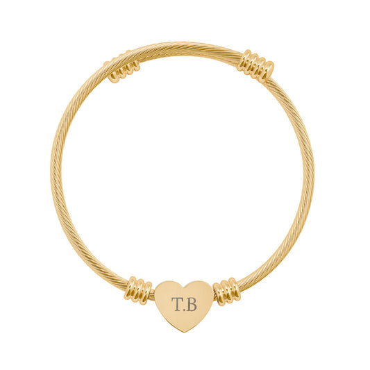 Silver or gold engravable heart cuff bracelet with personalized initials, stylish cable bangle accessory.