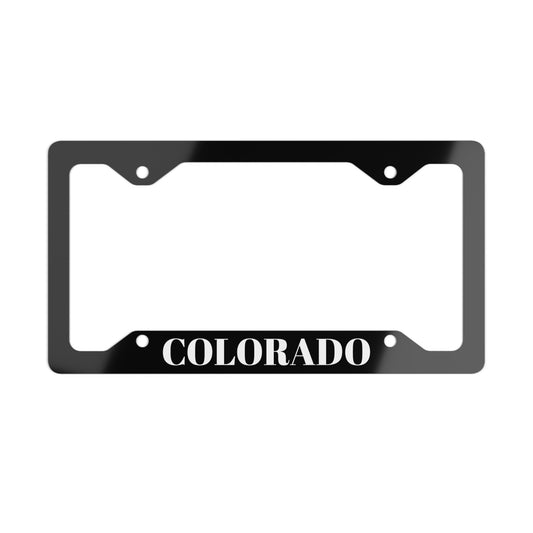 Stainless steel Colorado metal license plate frame with state name, car accessory, durable and stylish for vehicle customization.