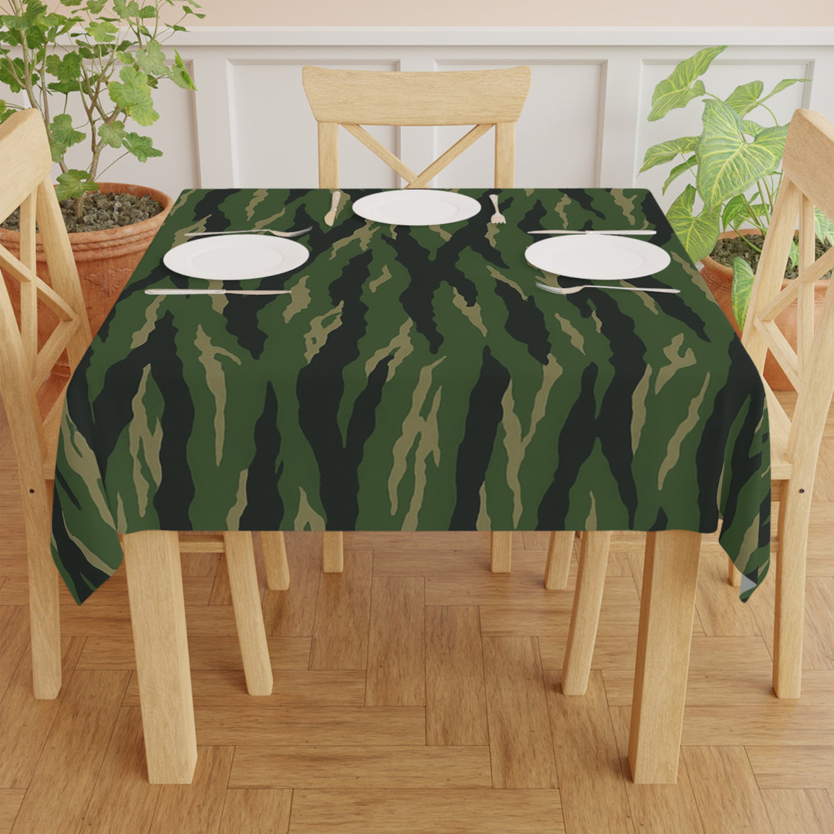 Green camouflage tiger stripe military print tablecloth by Printify, featuring a bold camo design on fabric surface.