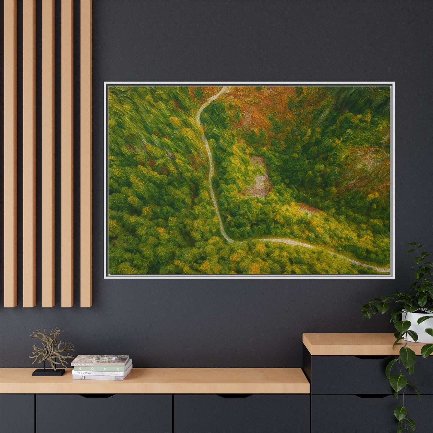 Colorful framed canvas wall art featuring an aerial view of a forest path in a lush landscape by Printify.
