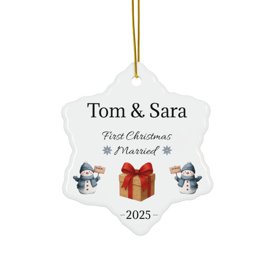 Personalized ceramic ornament with "Tom & Sara First Christmas Married 2025" text, featuring festive holiday design.
