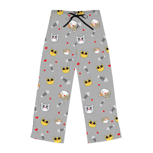 Cute grey women's pajama pants with cat face pattern and all-over print, perfect for sleep and lounging by Printify.