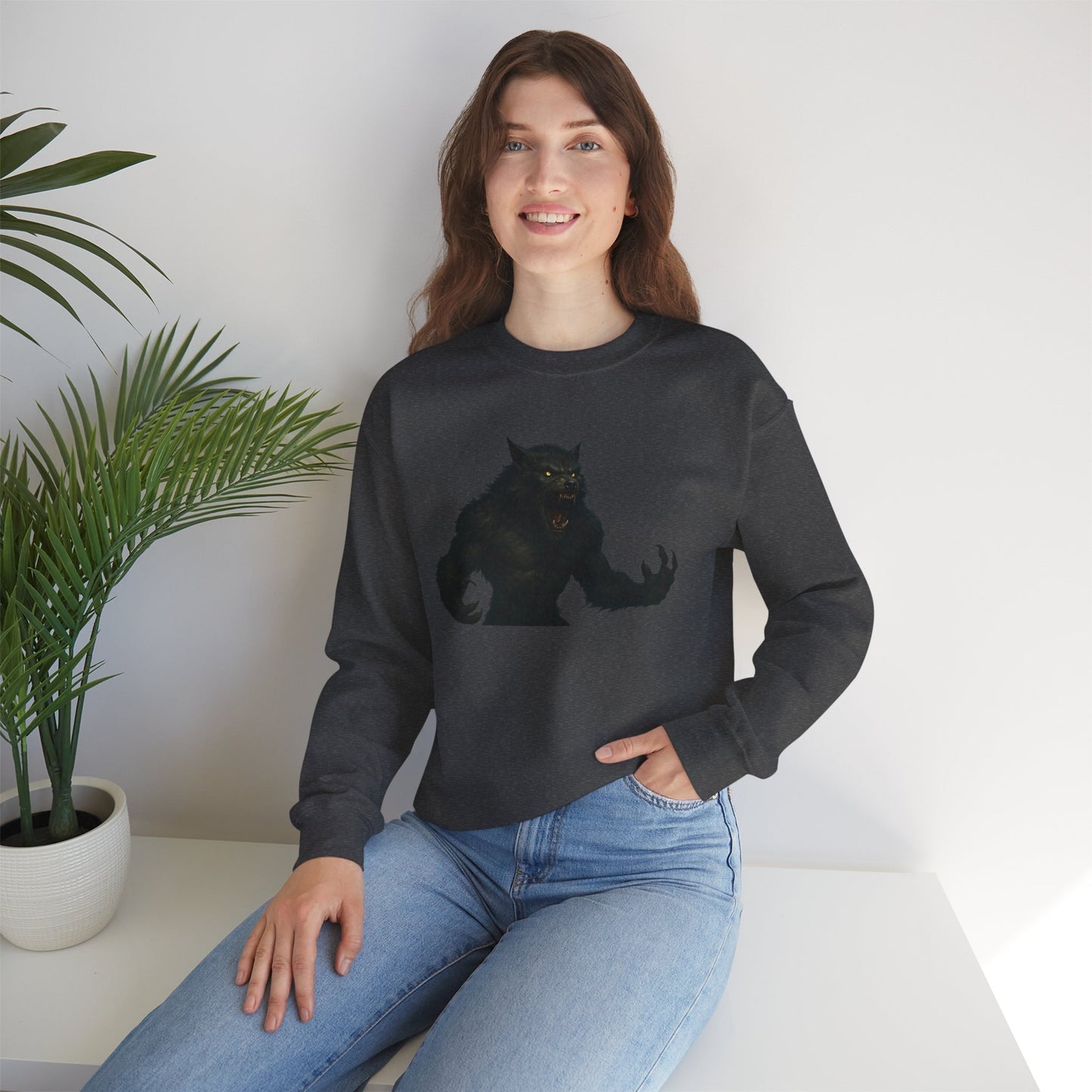 Dark moon horror sweatshirt featuring a werewolf illustration, long sleeve crewneck made by Printify.