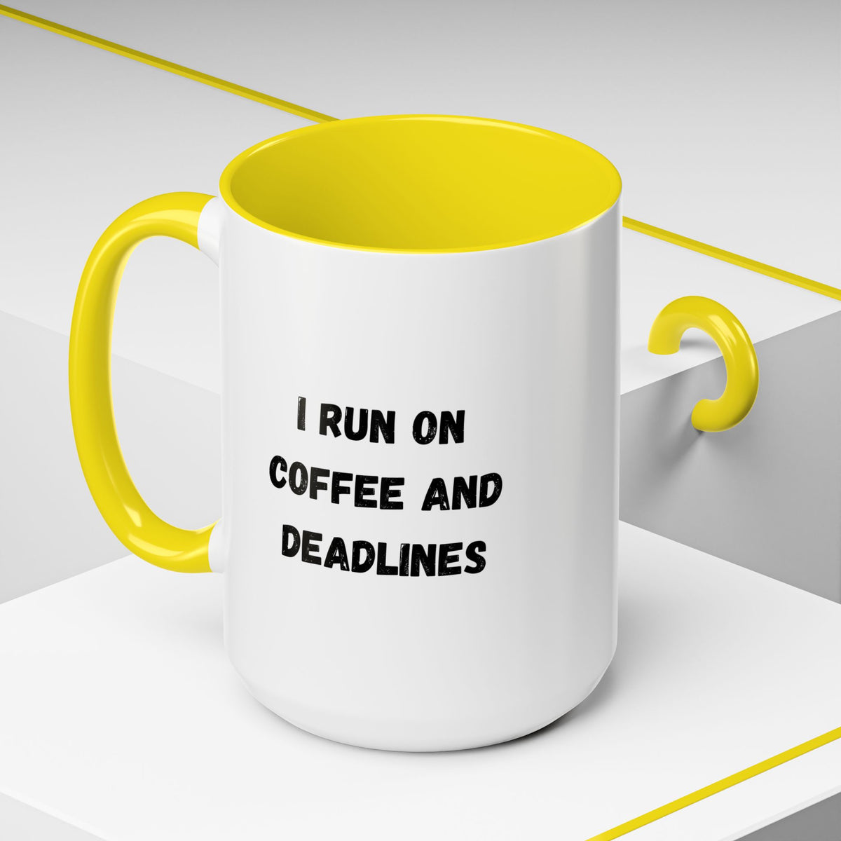 White ceramic coffee mug with black text saying "I Run on Coffee and Deadlines" for office or home use.