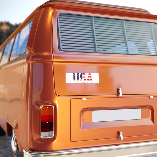 Red, white, and blue USA flag bumper sticker decal on paper, patriotic design for cars or surfaces.