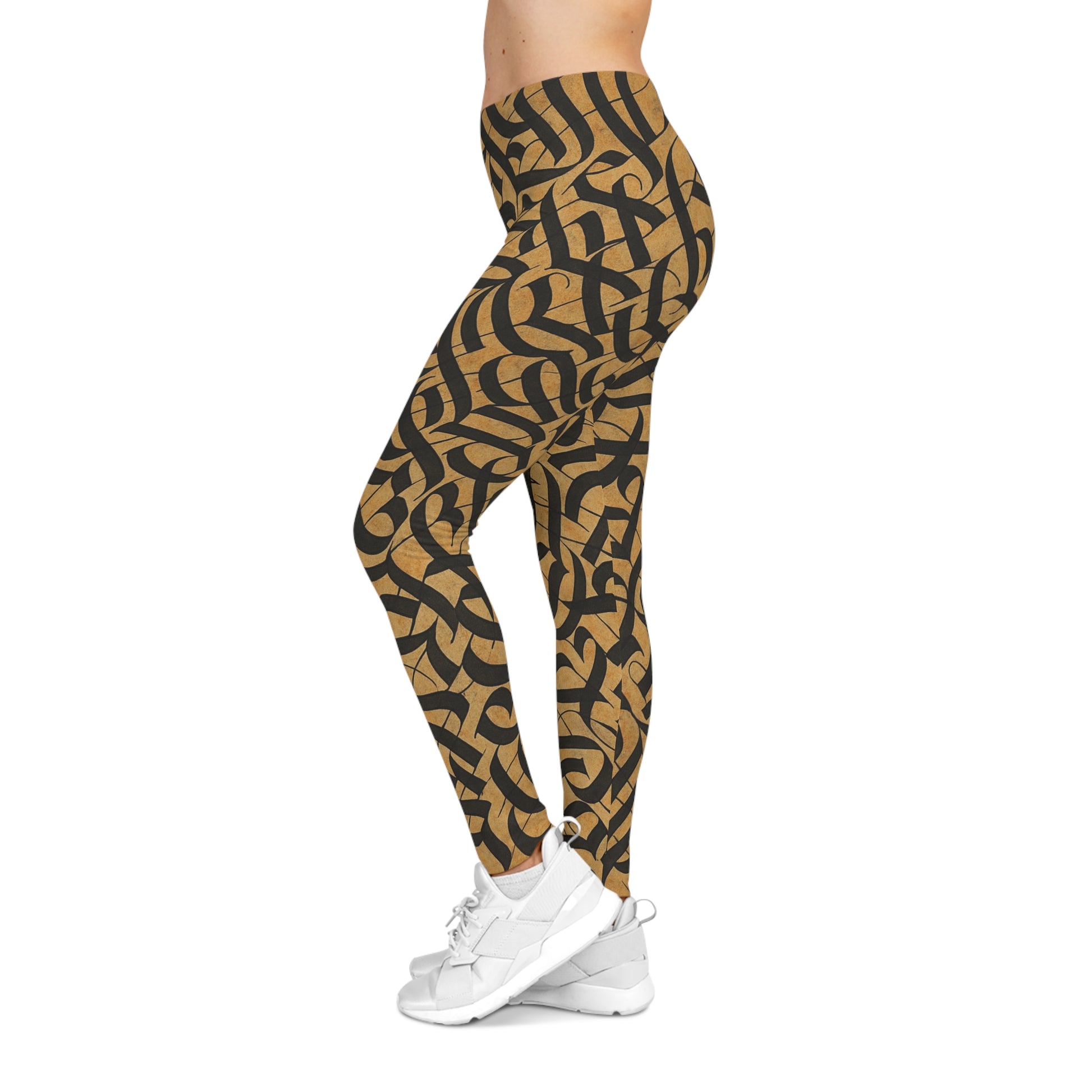 Black and gold tribal knotwork print women's leggings with all-over pattern, stylish and comfortable athletic wear by Printify.