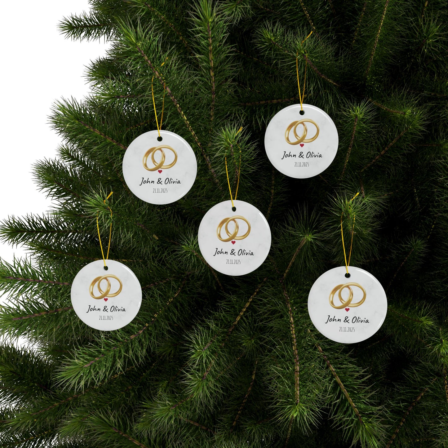 Round ceramic wedding rings ornament with personalized names and date, featuring floral design, by Printify.
