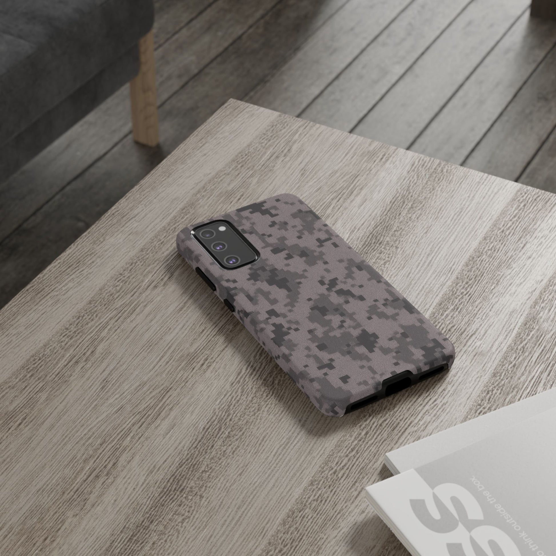 Gray digital camouflage phone case by Printify, tough protective cover for smartphones with a modern camouflage design.