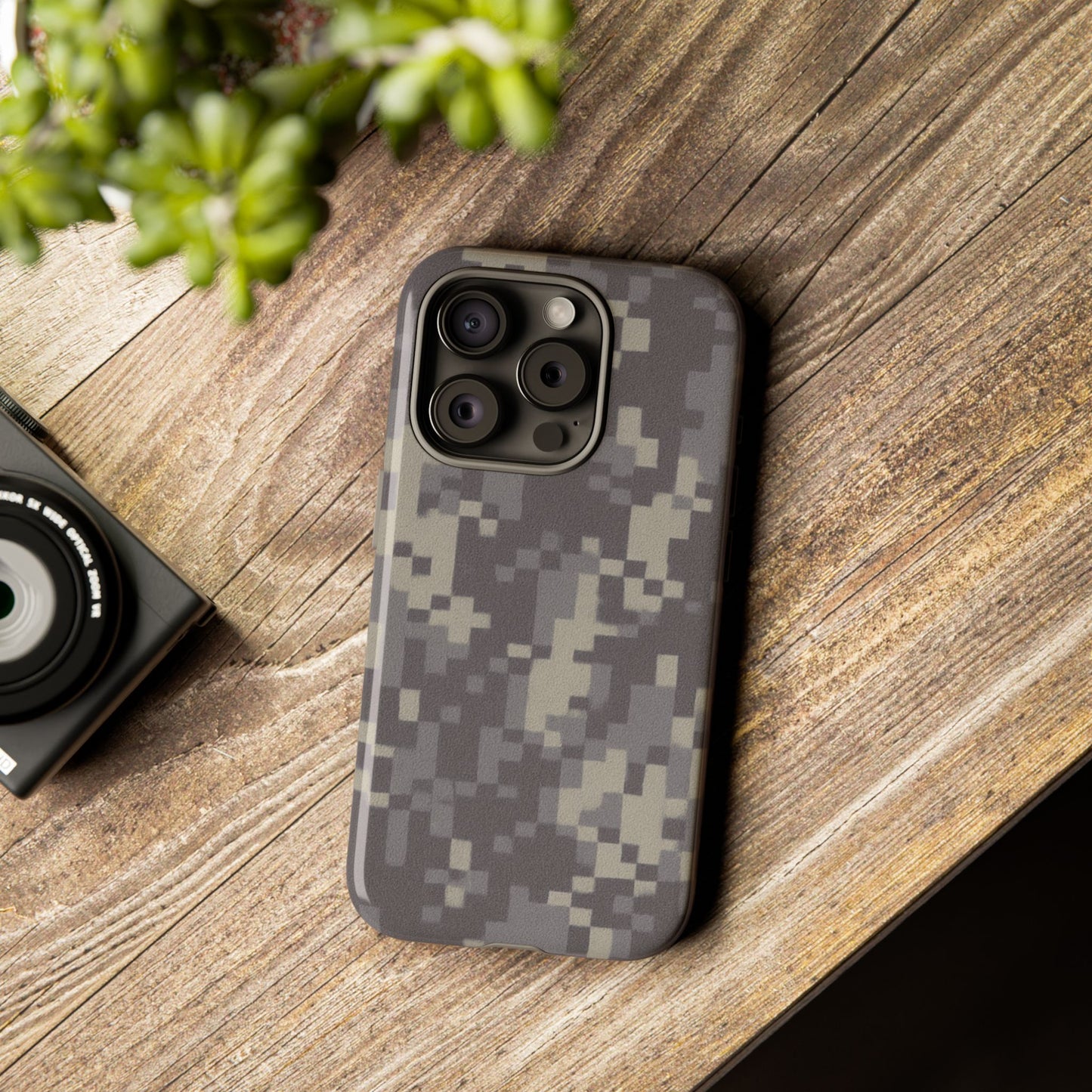 Camouflage tough phone case by Printify with rugged digital camo design, providing durable protection for smartphones.