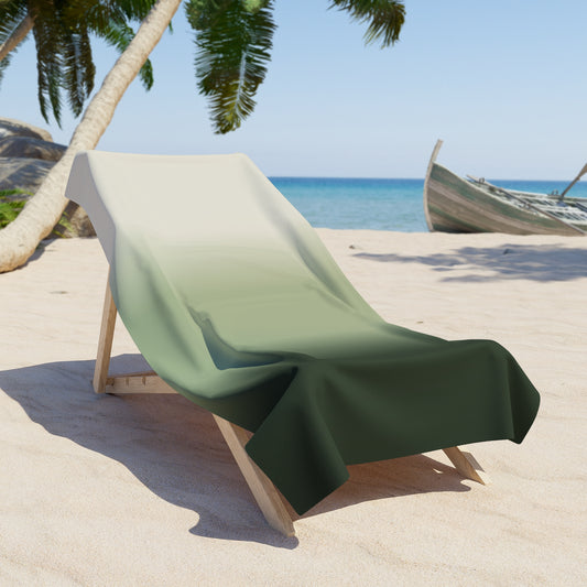 Green ombre gradient beach towel with coastal stripe fade, featuring vibrant colors and soft fabric for seaside relaxation.
