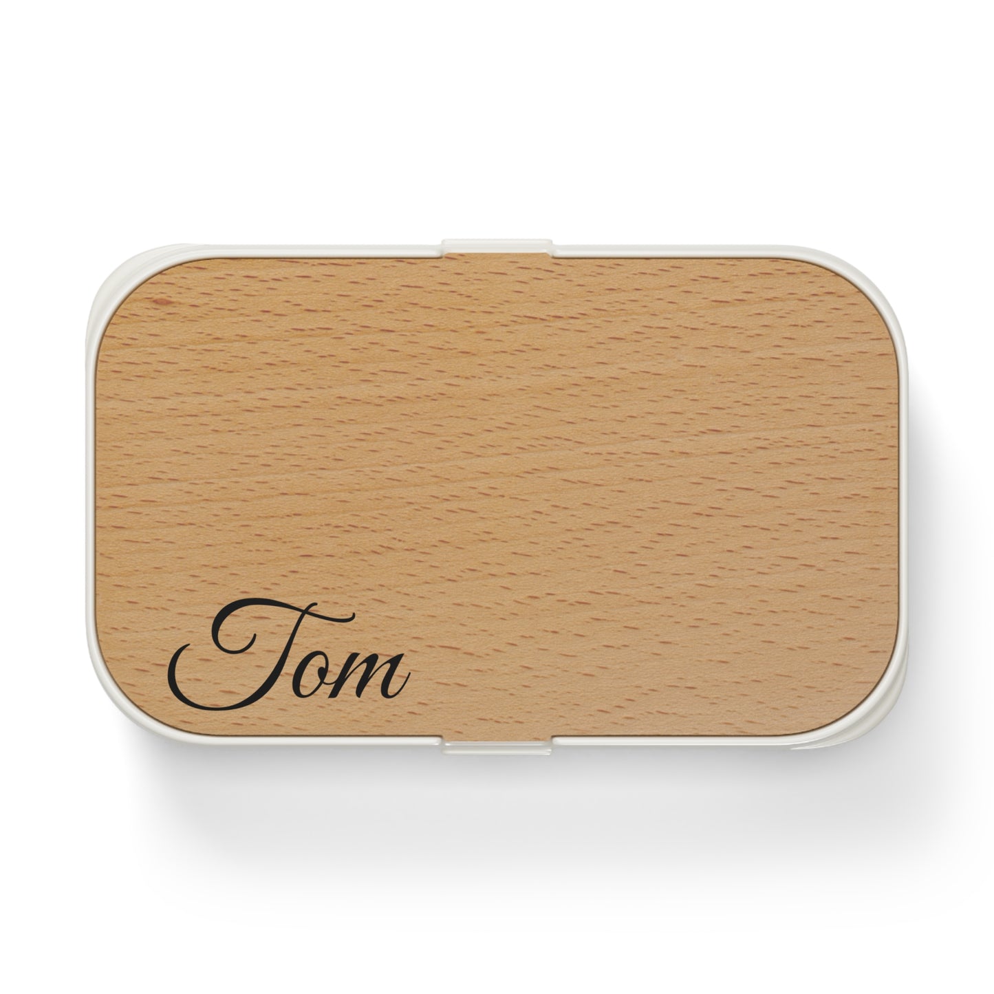 Personalized wooden bento lunch box with engraved name "Tom," accessories by Printify, showing a natural wooden finish and compact design.
