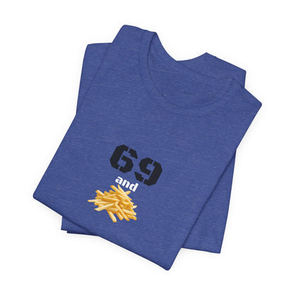 Unisex graphic T-shirt featuring a humorous 69 and French fries design, made by Printify, displayed on a hanger.