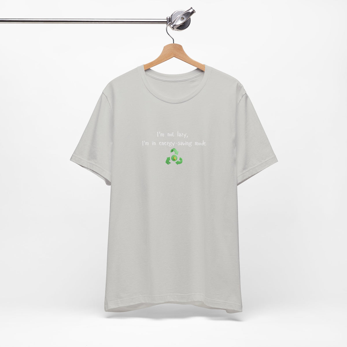 Eco-friendly mock T-shirt with humorous "I'm Not Lazy, I'm an Energy-Saving" print, casual unisex design from Printify.