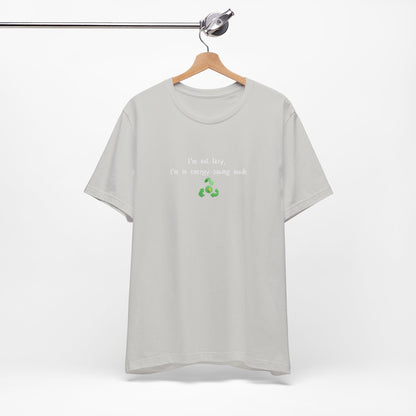 Eco-friendly mock T-shirt with humorous "I'm Not Lazy, I'm an Energy-Saving" print, casual unisex design from Printify.