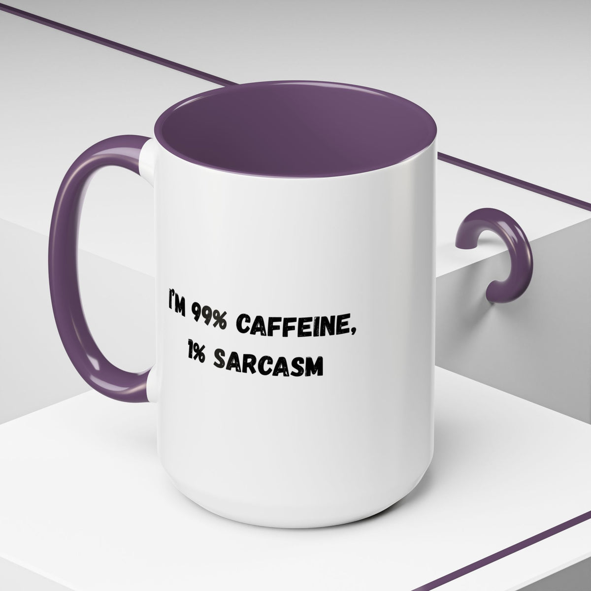 Ceramic coffee mug with "I'm 99% Caffeine, 1% Sarcasm" print, featuring a white background and black text design.