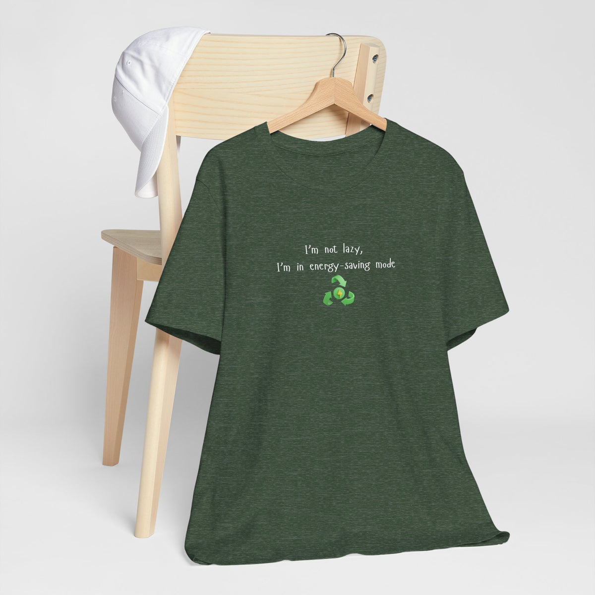 Eco-friendly mock T-shirt with humorous "I’m Not Lazy, I’m an Energy-Saving Mock" print, casual fit, lightweight fabric.