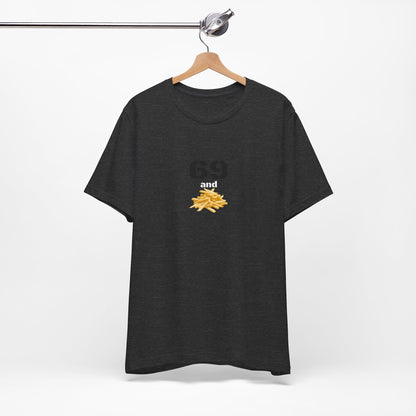 Unisex graphic T-shirt featuring a humorous "69 & French Fries" design in bold colors, made by Printify.