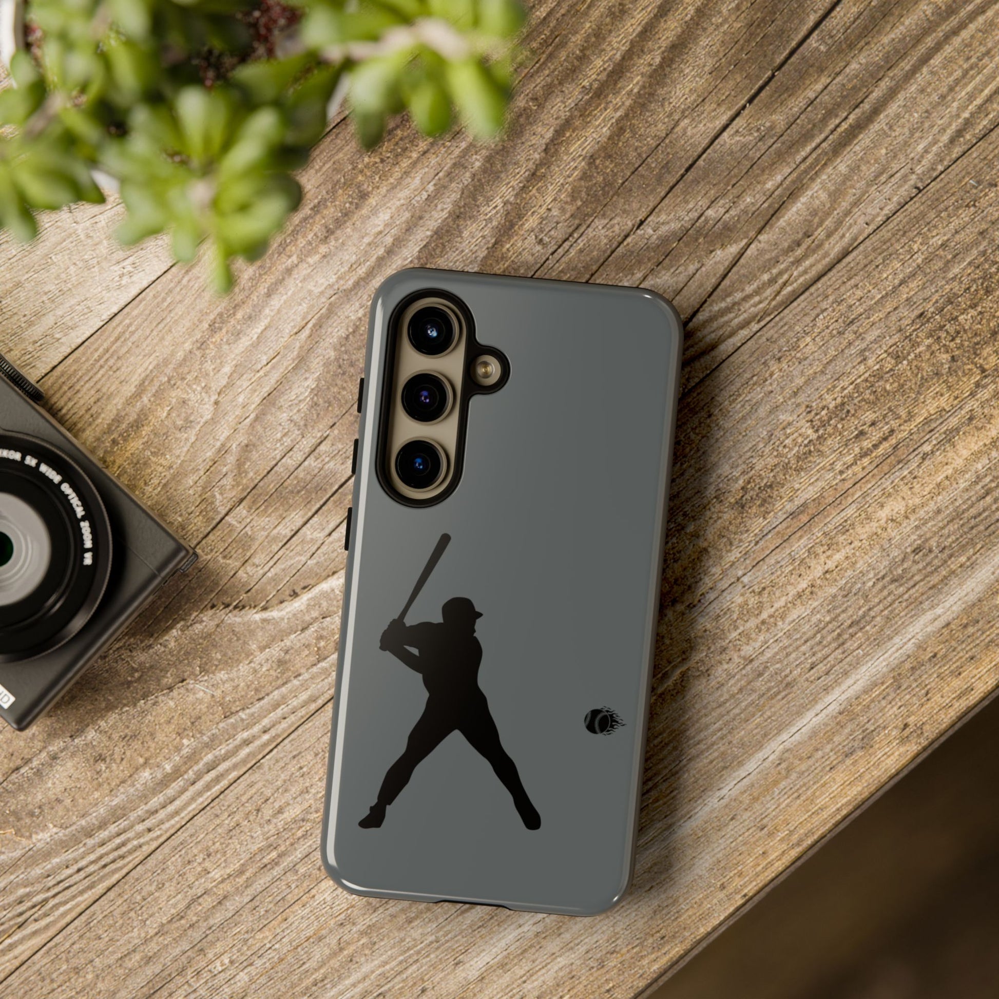 Black baseball silhouette tough phone case for iPhone, protective sporty design by Printify, with a rugged, durable appearance.