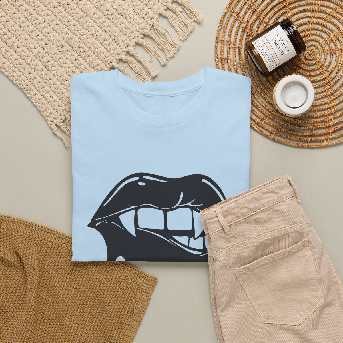 Graphic T-shirt featuring a dripping lips 'hmm...' bite design in bold black print on white fabric.