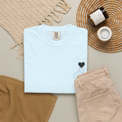 Black T-shirt with minimal white finger heart graphic, casual style, designed by Printify.