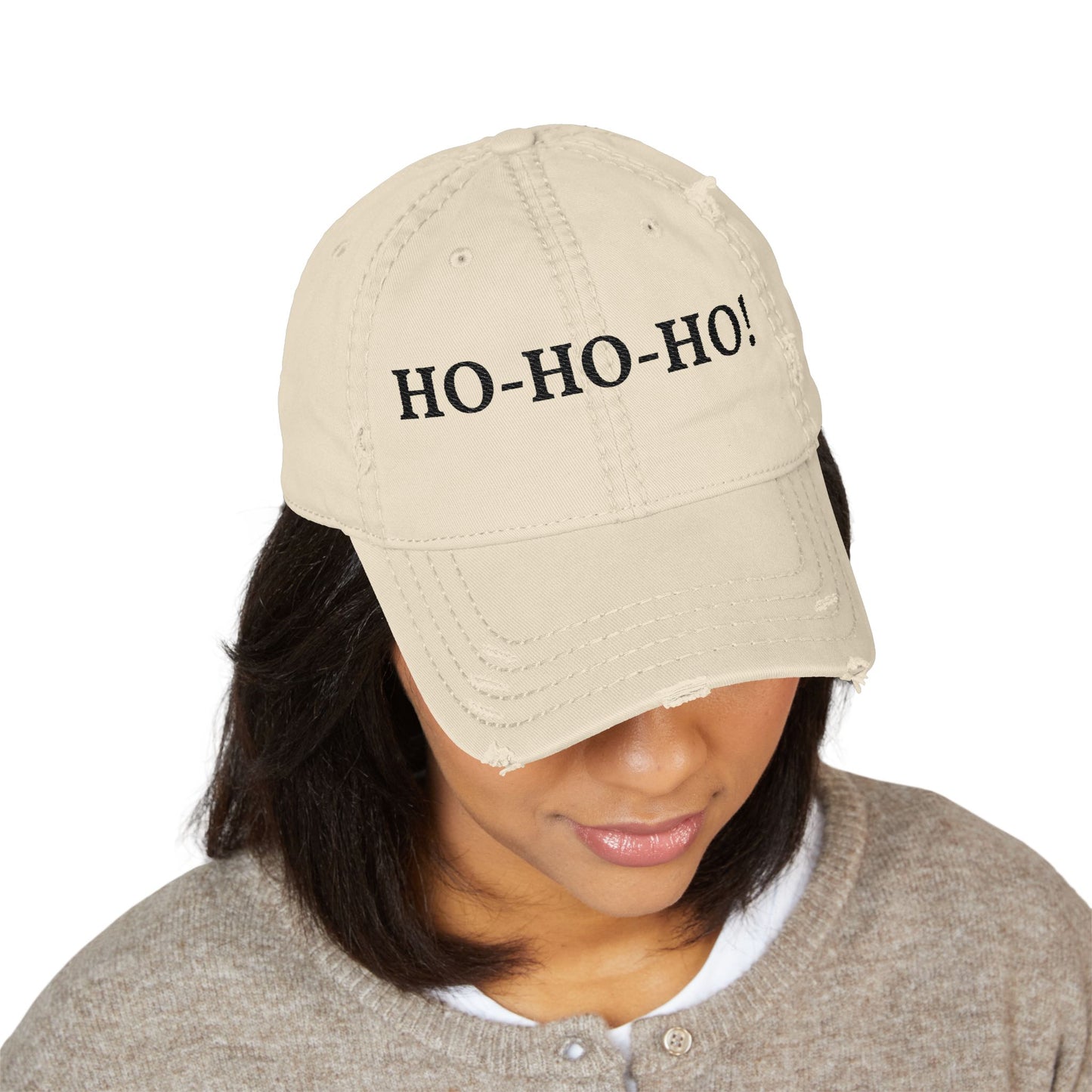 Distressed embroidered "HO-HO-HO" dad hat by Printify, baseball cap with festive holiday design and adjustable strap.