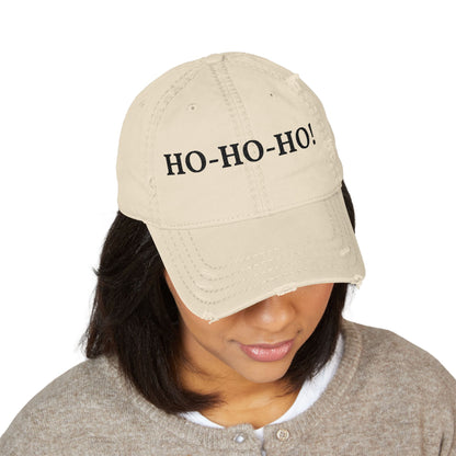 Distressed embroidered "HO-HO-HO" dad hat by Printify, baseball cap with festive holiday design and adjustable strap.
