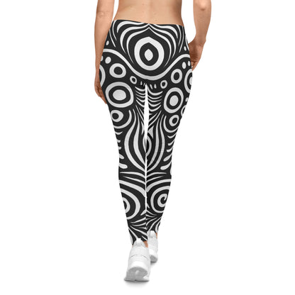 Black and white swirl pattern leggings with retro psychedelic all-over print by Printify, showing vibrant, bold design on stretchy fabric.