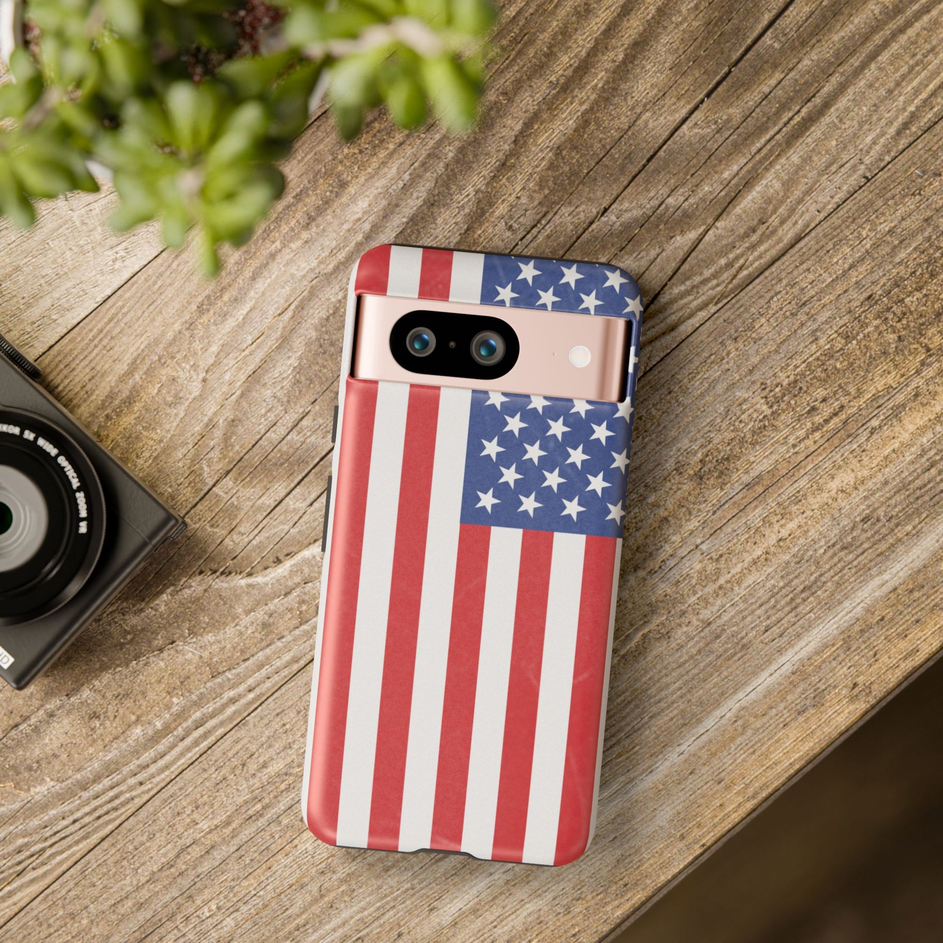Durable American flag phone case for iPhone with patriotic design, made by Printify, featuring bold red, white, and blue flag graphics.