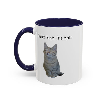 Ceramic cat coffee mug with "Don't rush, it's hot!" quote, 11 oz, featuring a playful cat design on a white background.