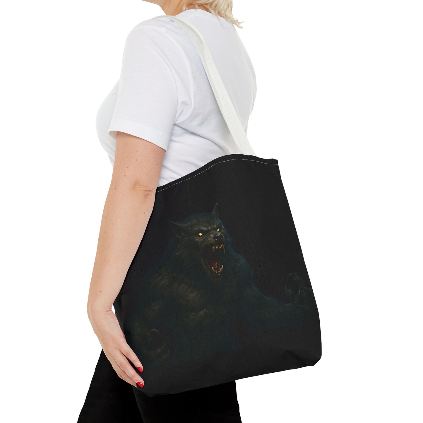 Black tote bag featuring dark Halloween-inspired werewolf art, perfect for horror fans and spooky season accessories.
