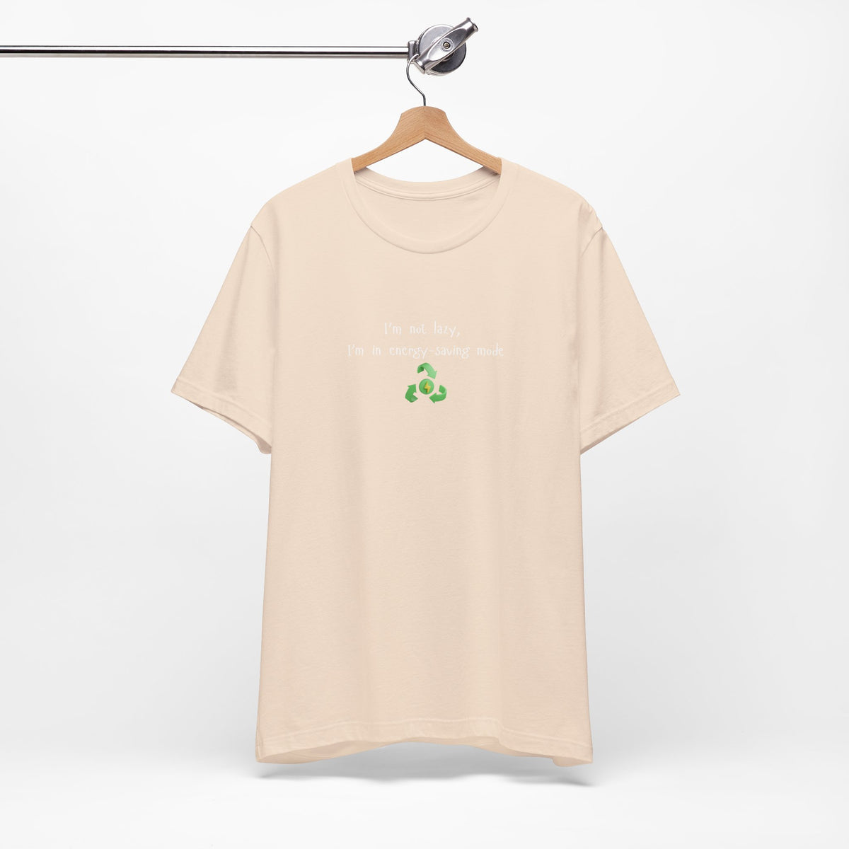 Eco humor T-shirt featuring the phrase “I’m Not Lazy, I’m an Energy-Saving Mock” by Printify, casual unisex tee in soft fabric.