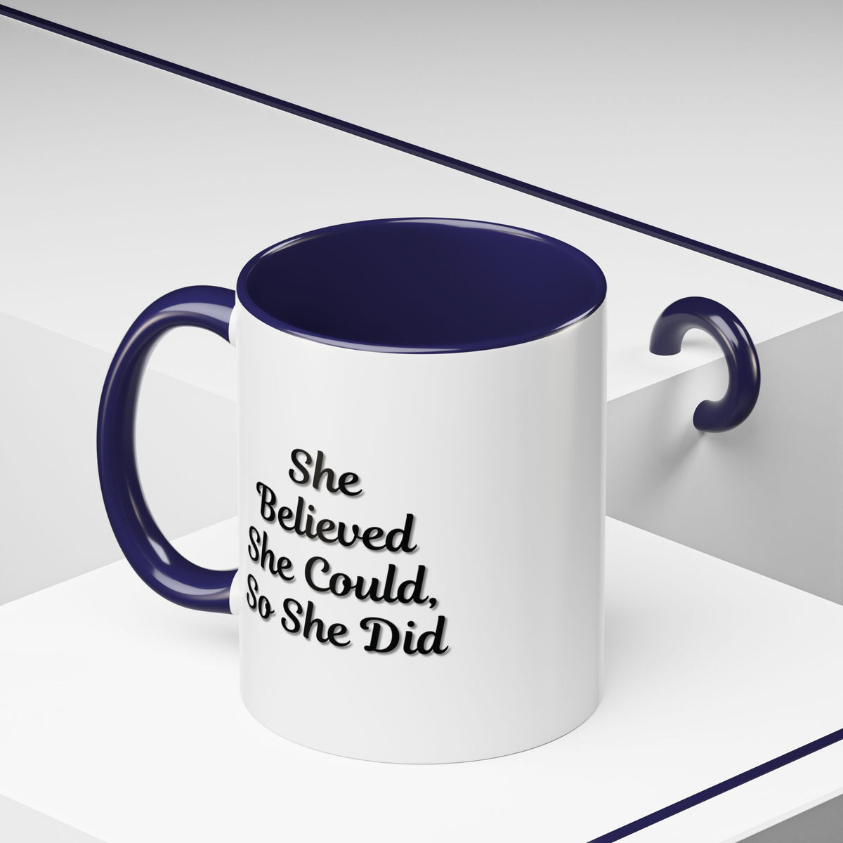 Motivational coffee mug with "She Believed She Could, So She Did" quote, ceramic mug for inspirational drinks.