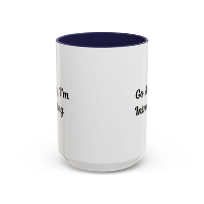 Ceramic introvert coffee mug with "Go Away, I'm Introverting" slogan, 11 oz, featuring a white background and bold black text.