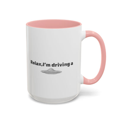 Ceramic coffee mug with UFO accent design and the phrase "Relax, I’m Driving" in black text, 11 oz size, Printify brand.