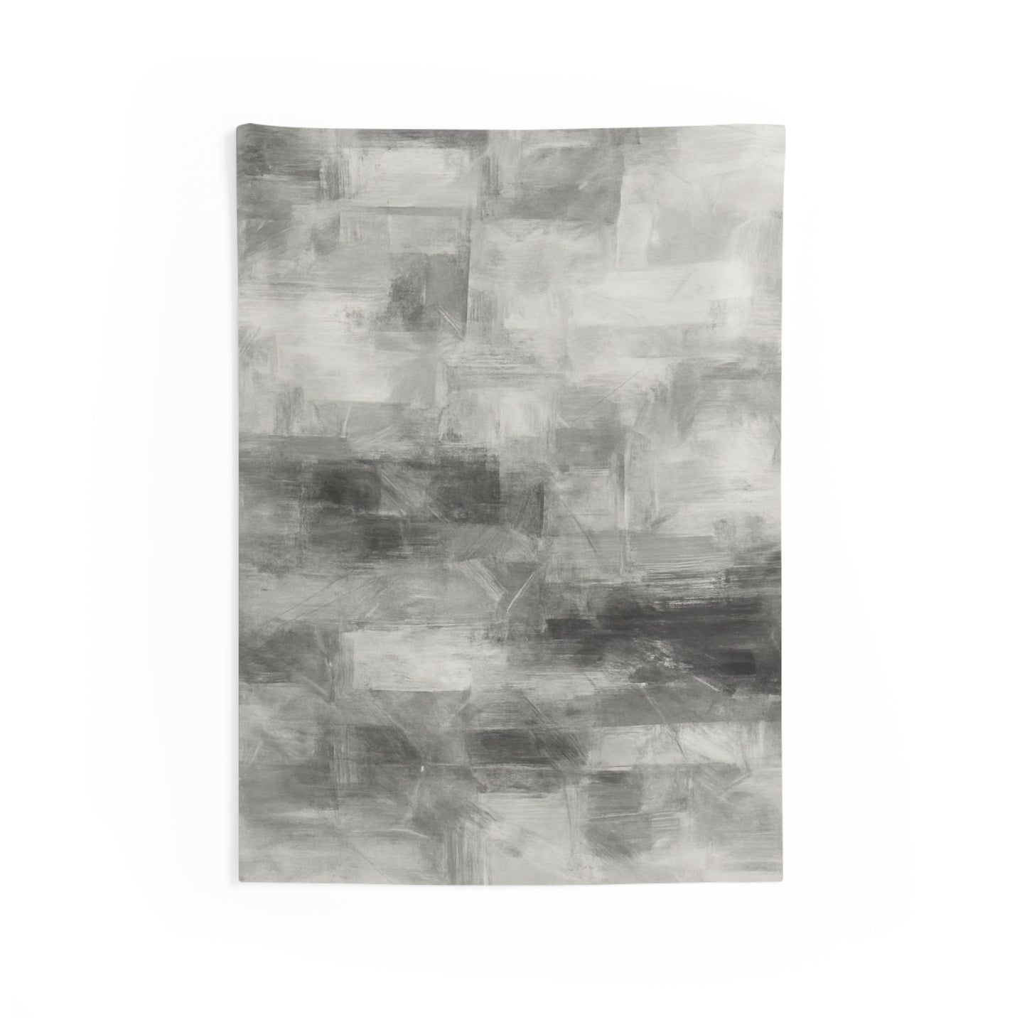Black and white minimalist wall tapestry hanging in a bedroom or living room setting, showcasing modern decor style.
