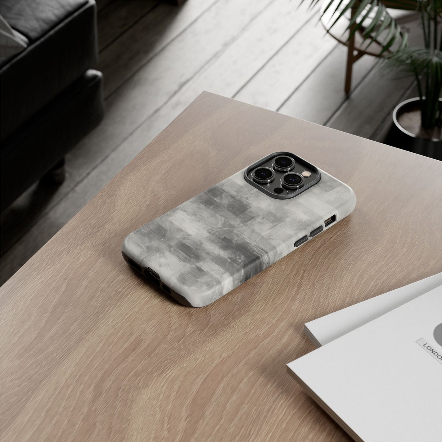 Abstract gray grid design phone case for iPhone, tough protective cover by Printify with modern geometric pattern.