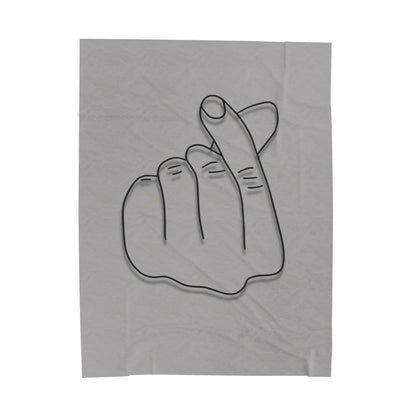 All-over print velveteen plush blanket featuring a heart gesture design, ideal for cozy home decor and gift-giving.