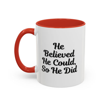 Printify "He Believed He Could So He Did" inspirational coffee mug with bold lettering on a white ceramic mug.