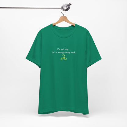 Eco humor T-shirt from Printify featuring the phrase "I'm Not Lazy, I'm an Energy-Saving Mock" on a casual cotton tee.