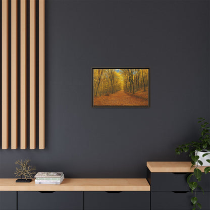 Framed canvas wall art featuring an autumn forest path with vibrant fall foliage, printed by Printify.