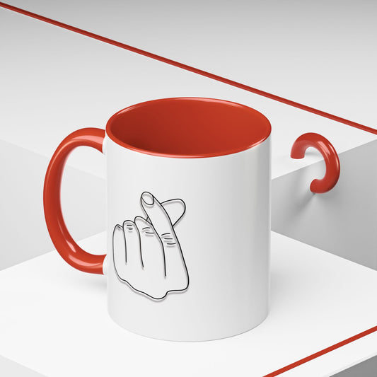 White ceramic coffee mug with minimal Korean finger heart accent design, available in 11oz and 15oz sizes, by Printify.