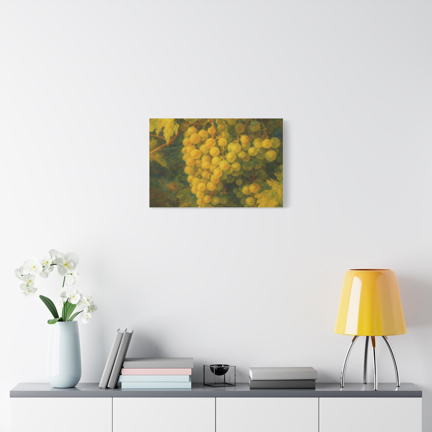Yellow grape cluster canvas print by Printify showing vibrant yellow grapes hanging in a cluster on a textured canvas background.