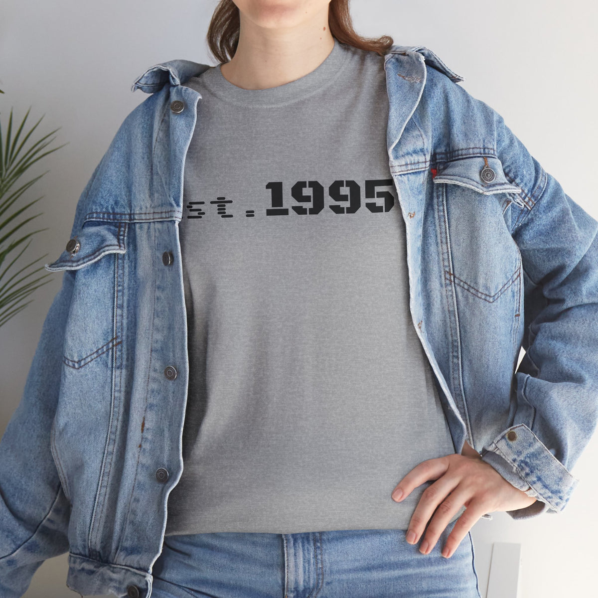 White vintage minimalist T-shirt with "Est. 1995" print, celebrating the birth year, by Printify.