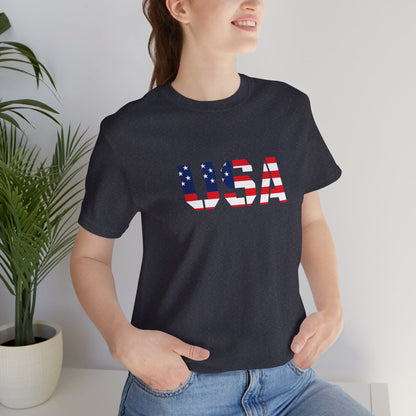 USA flag text T-shirt by Printify featuring patriotic design, perfect for Fourth of July celebrations and casual wear.