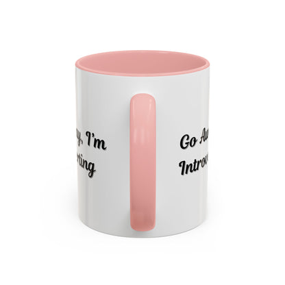 Ceramic coffee mug with "Go Away, I'm Introverting" text, 11 oz, perfect for introverts, by Printify.