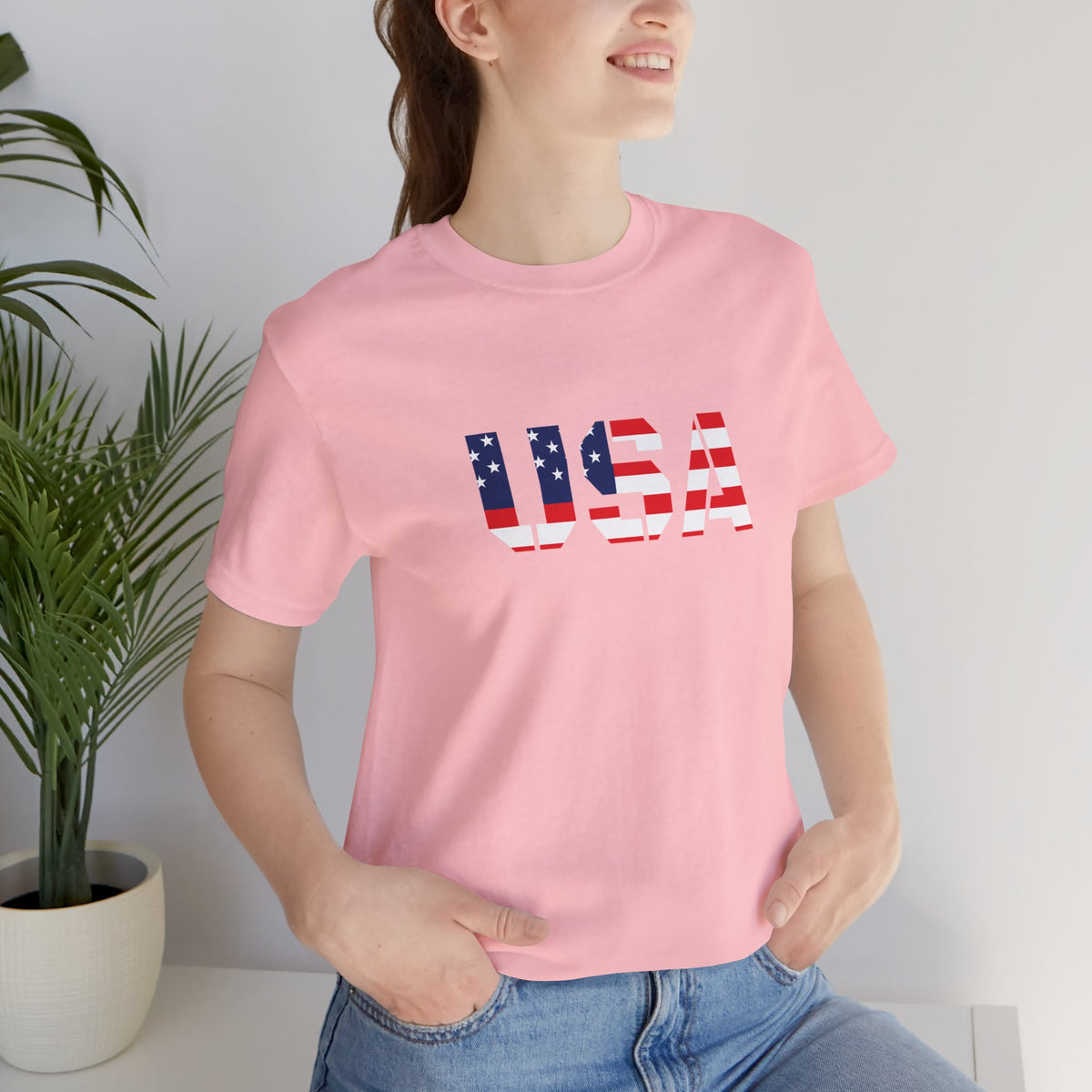 USA flag text T-shirt by Printify, patriotic Fourth of July T-shirt with bold American flag and text design.